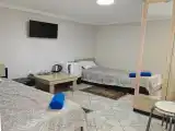 Двухместный номер с 2 отдельными кроватями и общей ванной комнатой