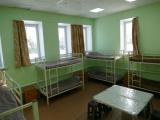 Спальное место на двухъярусной кровати в общем номере для мужчин