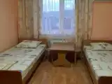Двухместный номер с 2 отдельными кроватями и общей ванной комнатой