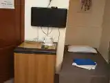 Двухместный номер с 1 кроватью или 2 отдельными кроватями и дополнительной кроватью