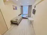 Четырехместный номер с ванной комнатой