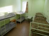 Спальное место на двухъярусной кровати в общем номере для мужчин и женщин