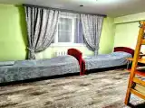 Четырехместный номер с общей ванной комнатой