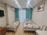 Трехместный номер с собственной ванной комнатой