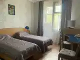 Двухместный номер с 2 отдельными кроватями и душем