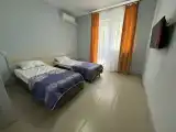 Трехместный номер с балконом