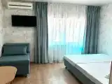Трехместный номер с балконом