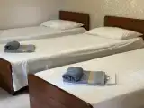 Четырехместный номер с ванной комнатой