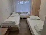 Трехместный номер эконом-класса с общей ванной комнатой