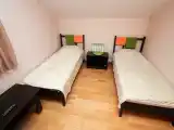 Двухместный номер эконом-класса без окна с удобствами на этаже