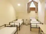 Кровать в общем номере для мужчин