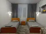 Двухместный номер с 2 отдельными кроватями и общим туалетом