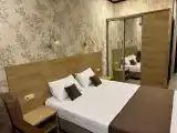Трехместный номер с балконом