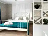Четырехместный номер с общей ванной комнатой