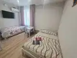 Четырехместный номер с ванной комнатой