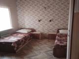 Двухместный номер с 2 отдельными кроватями и общим туалетом