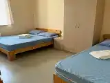 Четырехместный номер эконом-класса с общими удобствами на этаже