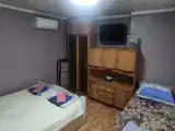 Трехместный номер с общей ванной комнатой