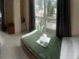 Трехместный номер с балконом