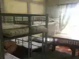 Трехместный номер с общей ванной комнатой и туалетом