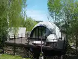 Купольный дом с видом на лес