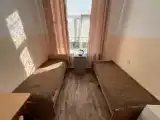 Односпальная кровать в общем номере