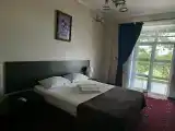 Улучшенный четырехместный номер