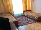 Стандартный двухместный номер с двумя односпальными кроватями