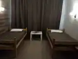 Двухместный номер с 2 отдельными кроватями и общей ванной комнатой