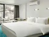 Апартаменты с двуспальной кроватью и раскладным диваном /корпус Yalta Intourist Green Park