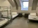 Кровать в общем номере для мужчин с 4 кроватями