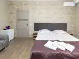 Четырехместный стандарт (все спальные места в одной комнате)