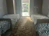 Четырехместный номер с общей ванной комнатой