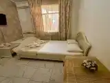 Четырехместный номер с общей ванной комнатой