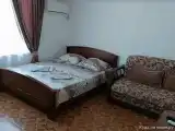 Двухместный номер с двуспальной кроватью и дополнительной кроватью