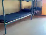 Общий номер для мужчин и женщин с 8 кроватями