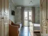 Трехместный номер с балконом на 2 этаже №11