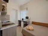 Семейный двухкомнатный номер Уютный с кухней и балконом, вид на улицу