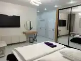 Двух местный номер с одной двуспальной кроватью и джакузи