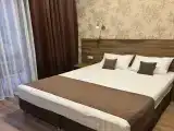 Трехместный номер с балконом
