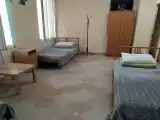 Кровать в общем номере с 4 кроватями