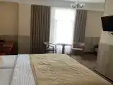 Четырехместный номер Делюкс
