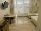 Трехместный номер с террасой