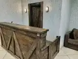 Спальное место на двухъярусной кровати в общем номере для мужчин и женщин