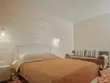 Двухместный номер с двуспальной кроватью и дополнительной кроватью