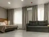 Четырехместный номер Делюкс