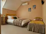 Трехместный номер с видом на горы