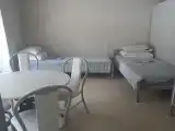 Односпальная кровать в общем номере