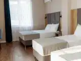 Четырехместный номер  Deluxe с балконом