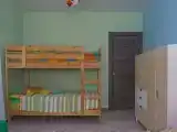 Четырехместный номер с общей ванной комнатой